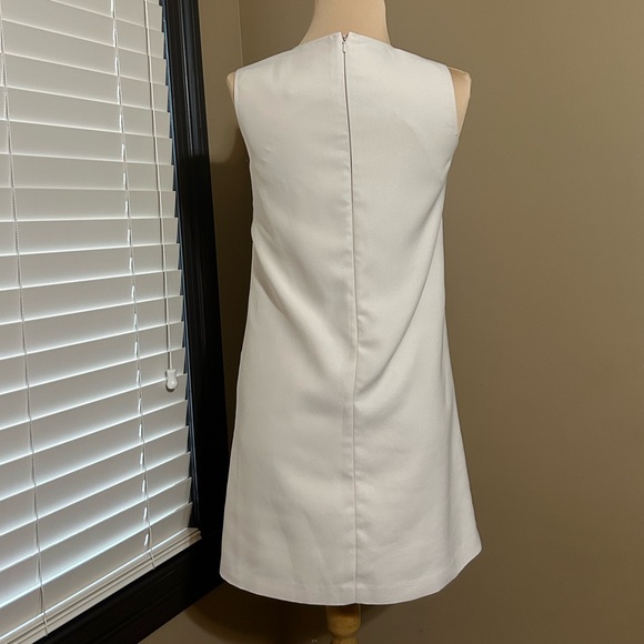 Chic Sleeveless White Cram Dress with Embellishments - Picture 3 of 5